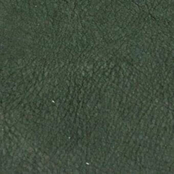 Rugiano rug, olive-green nabuk leather, smooth texture with mottled appearance and irregular lines, diffused lighting, neutral background.
